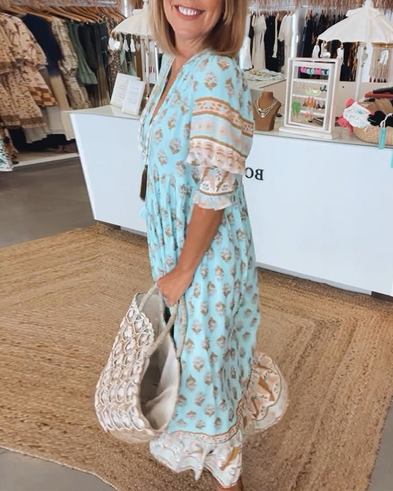 Thea – Robe fleurie chic à col en V