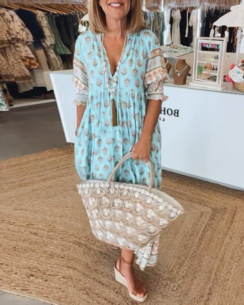 Thea – Robe fleurie chic à col en V
