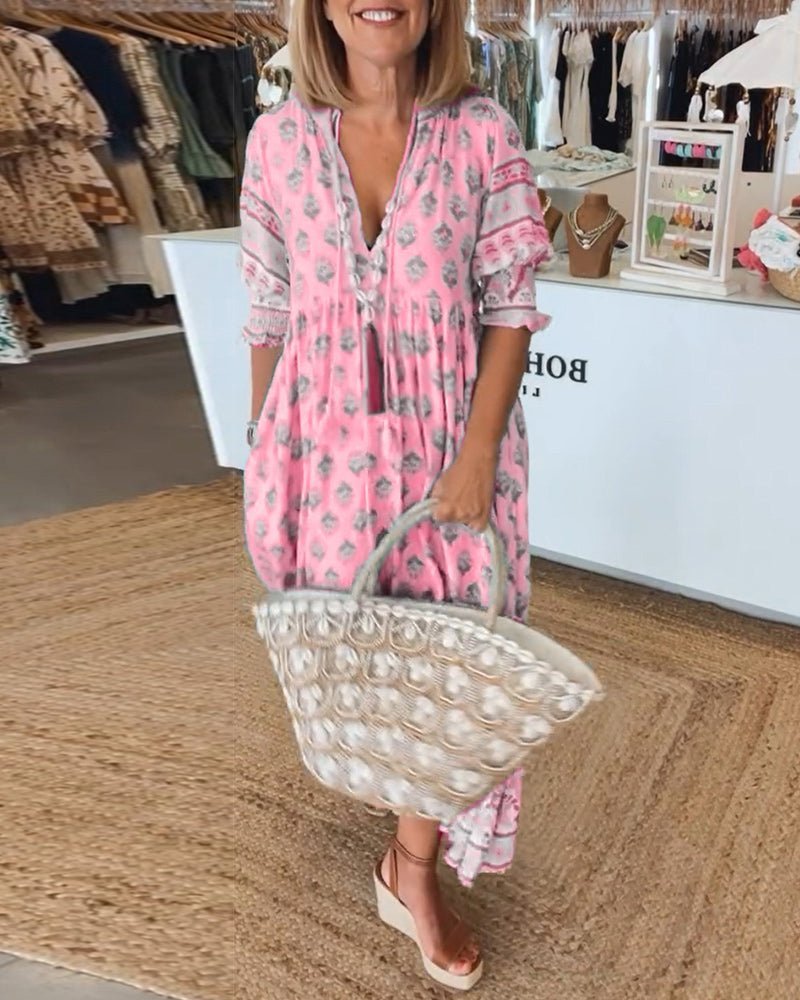 Thea – Robe fleurie chic à col en V