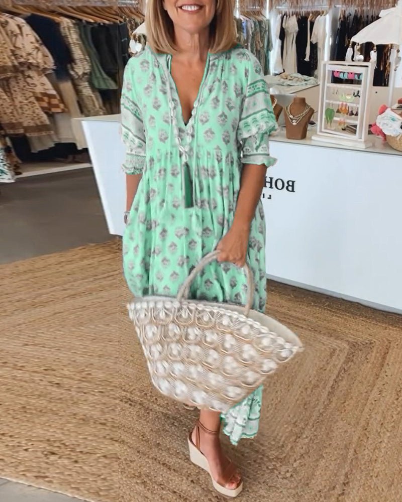 Thea – Robe fleurie chic à col en V