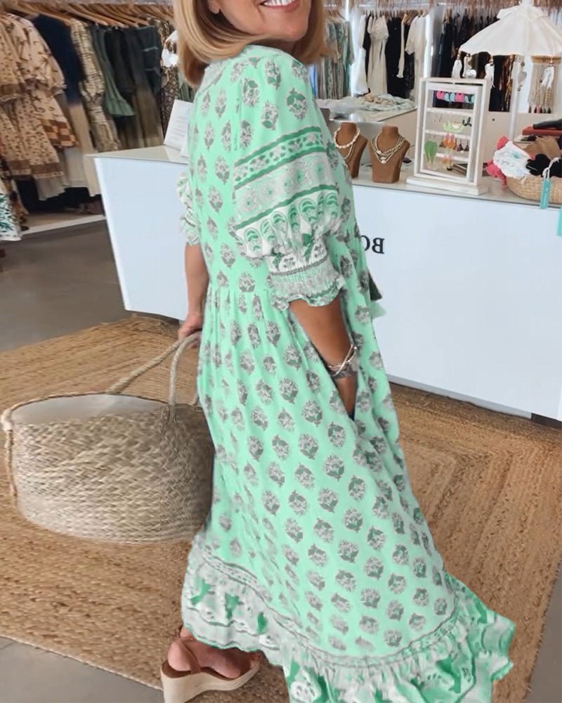 Thea – Robe fleurie chic à col en V
