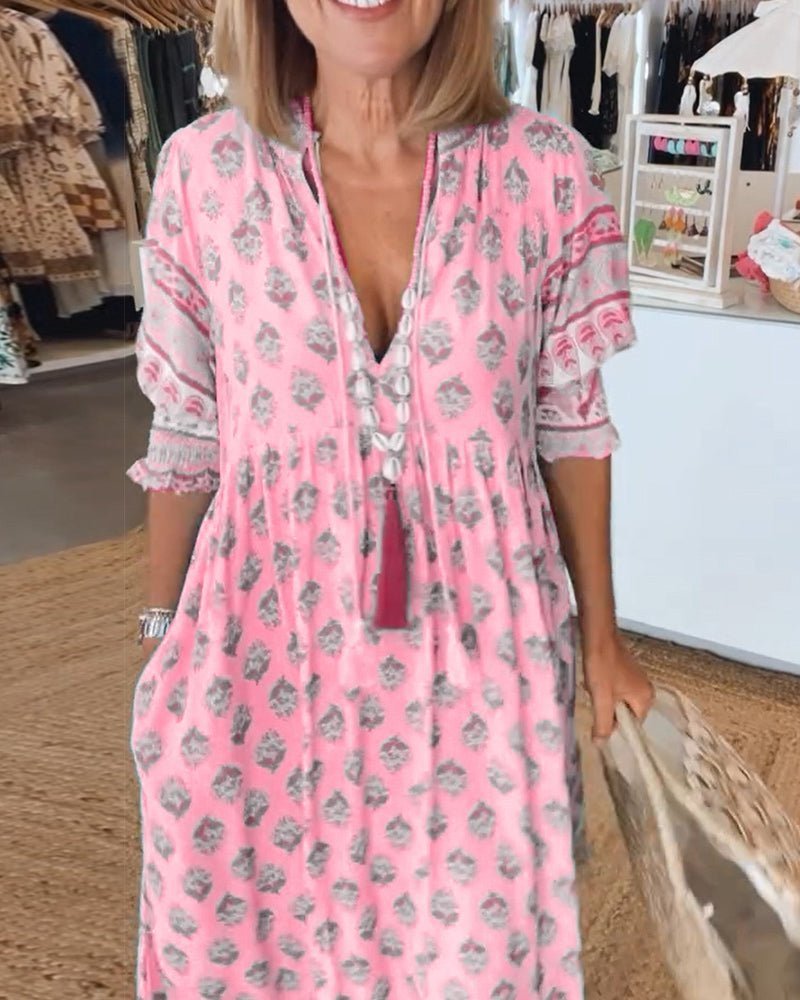 Thea – Robe fleurie chic à col en V