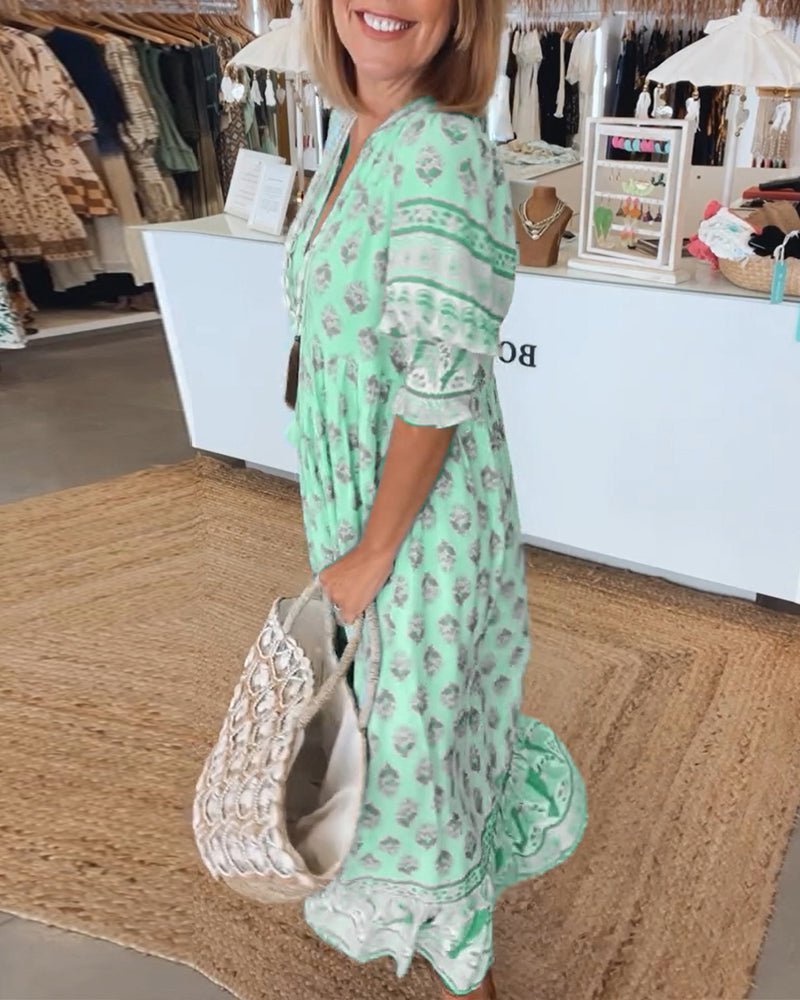 Thea – Robe fleurie chic à col en V