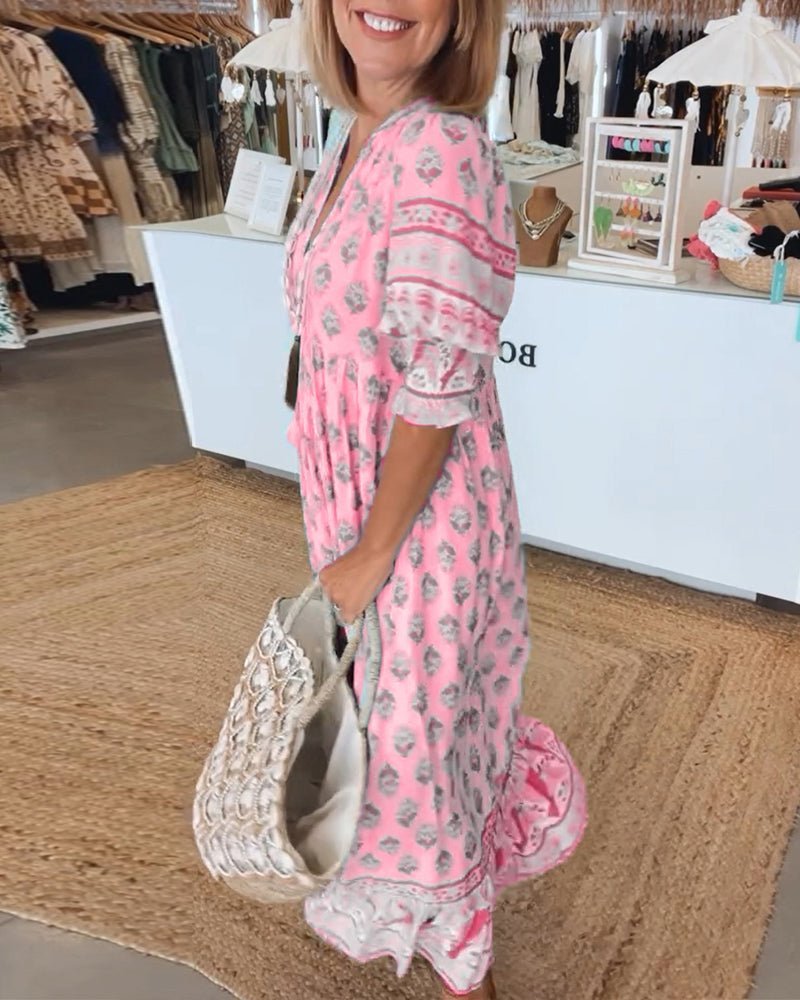 Thea – Robe fleurie chic à col en V