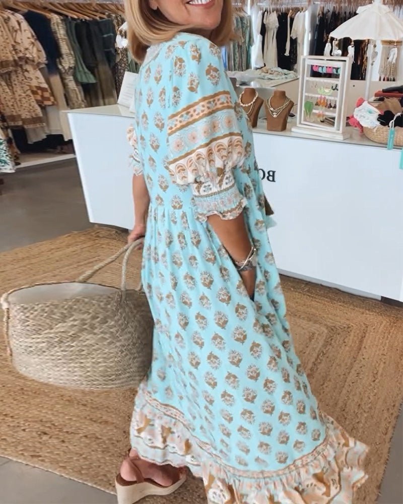 Thea – Robe fleurie chic à col en V