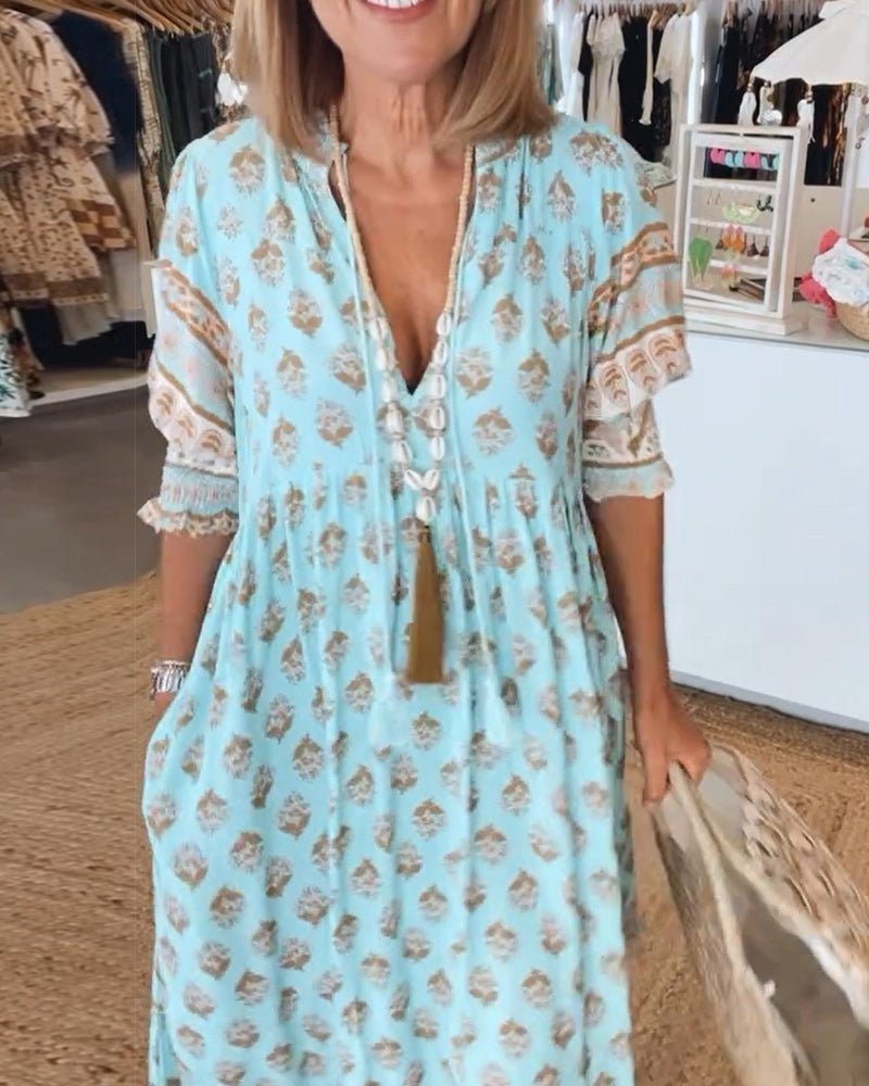 Thea – Robe fleurie chic à col en V